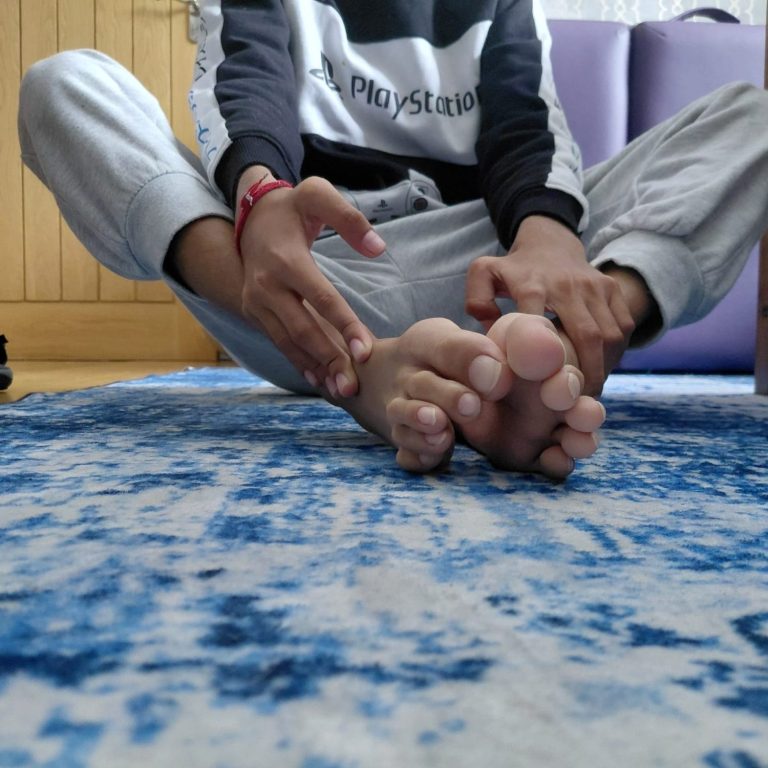 Client with Learning Disability with sensory impairment practising exercises during a Physiotherapy session